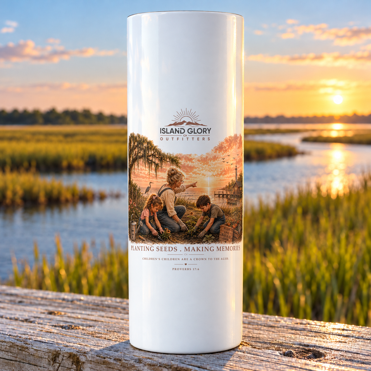 Planting Seeds design on a white Hogg 20 oz skinny tumbler beside an Eastern North Carolina coastal marsh.