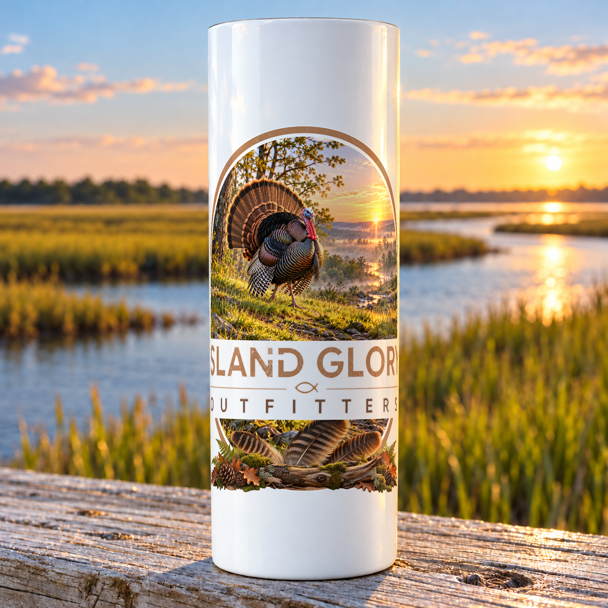 Turkey Hollow design on a white Hogg 20 oz skinny tumbler beside an Eastern North Carolina coastal marsh.